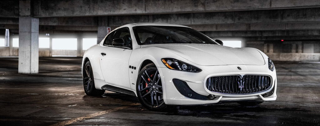 White Maserati in parking garage