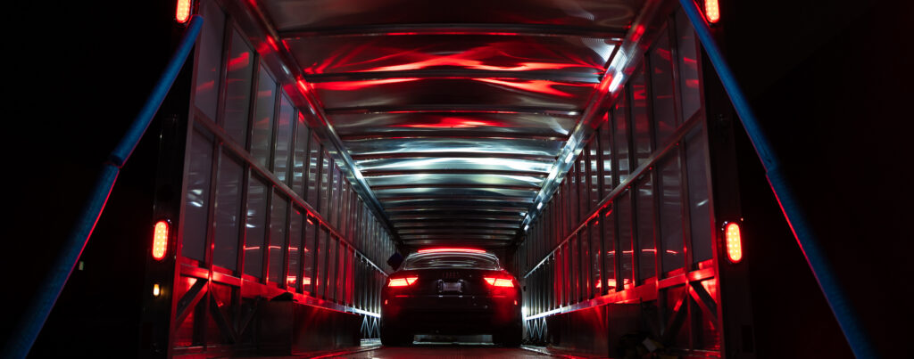 Luxury car in shipping container